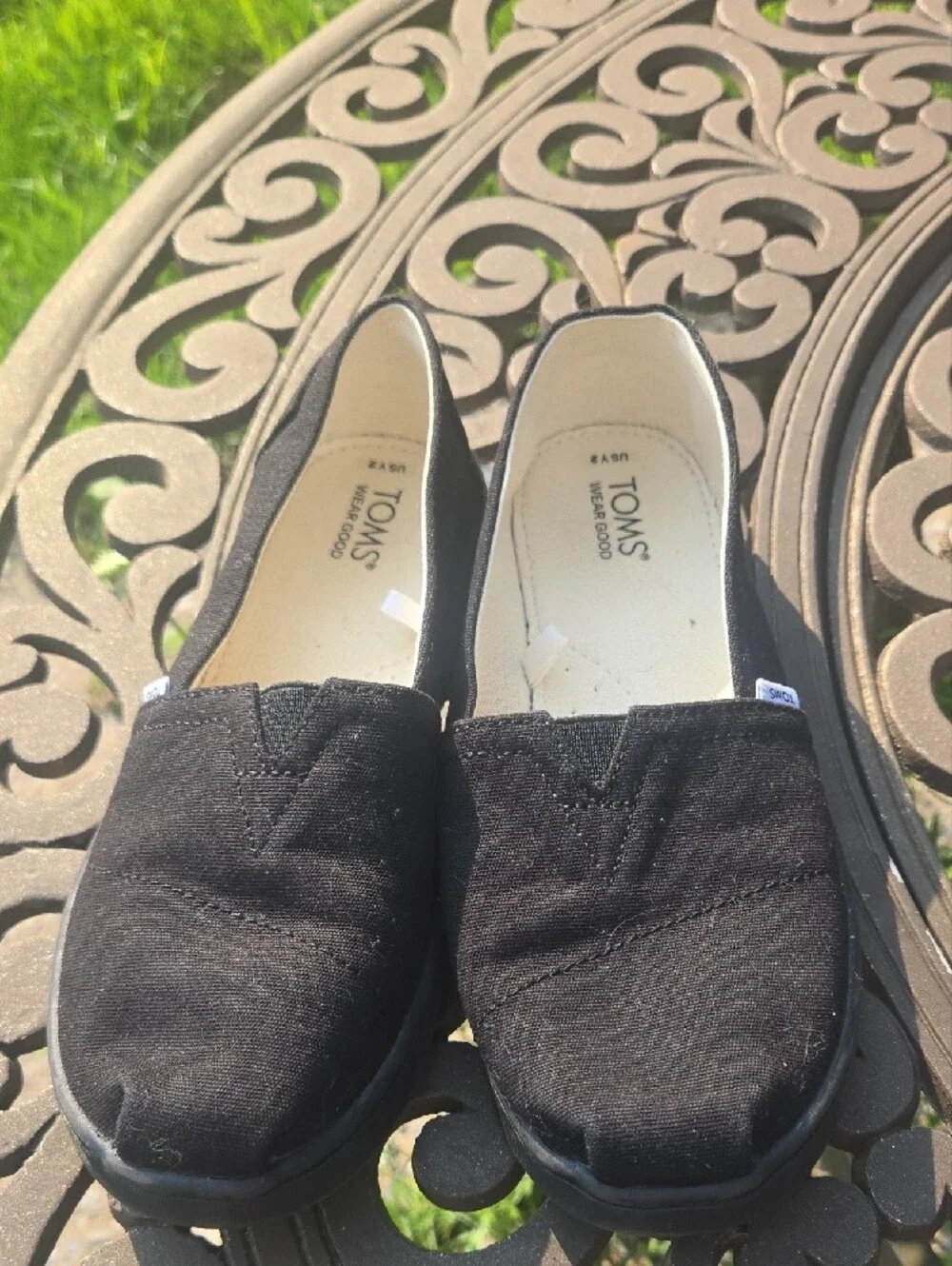 TOMS Women's Black Canvas Slip-On Moccasins